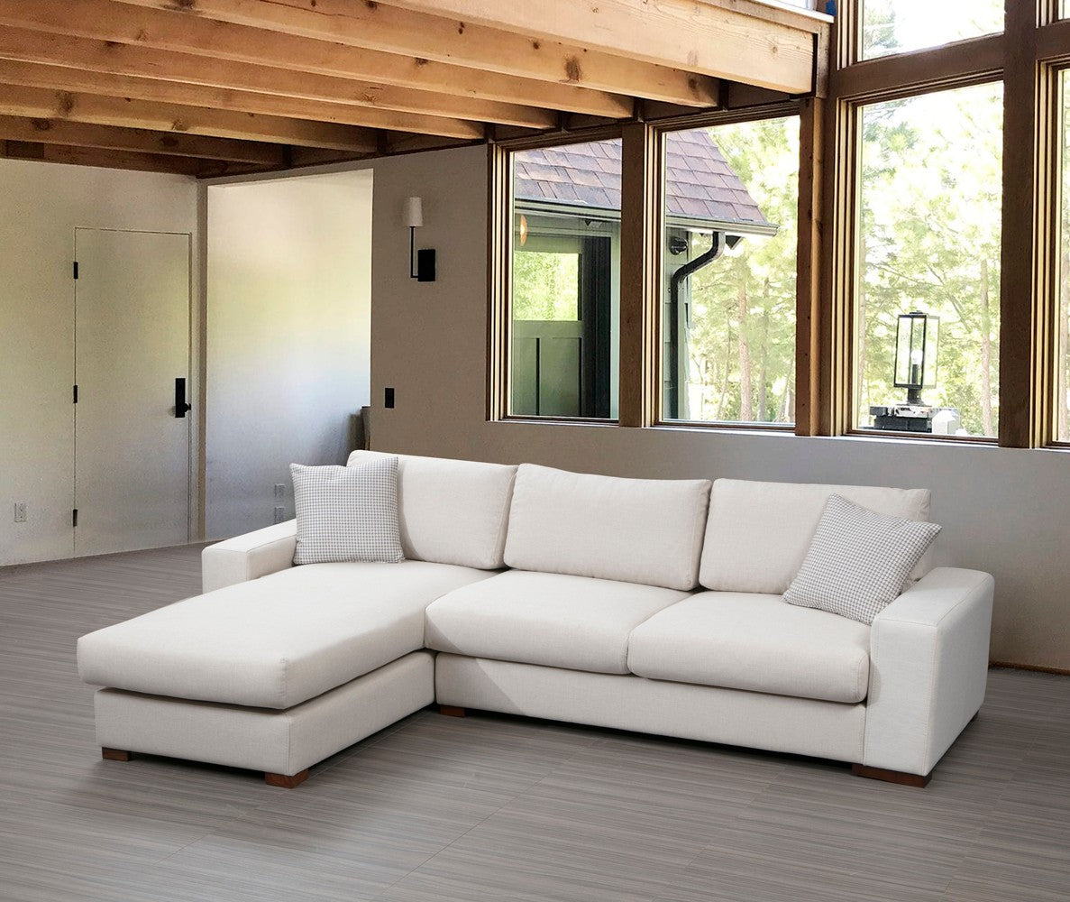 Sofá de canto elegante, 270 x 194 cm, estrutura de madeira de faia, 100% poliéster, pernas de nogueira, almofadas portáteis, lavável a seco, design escandinavo, branco