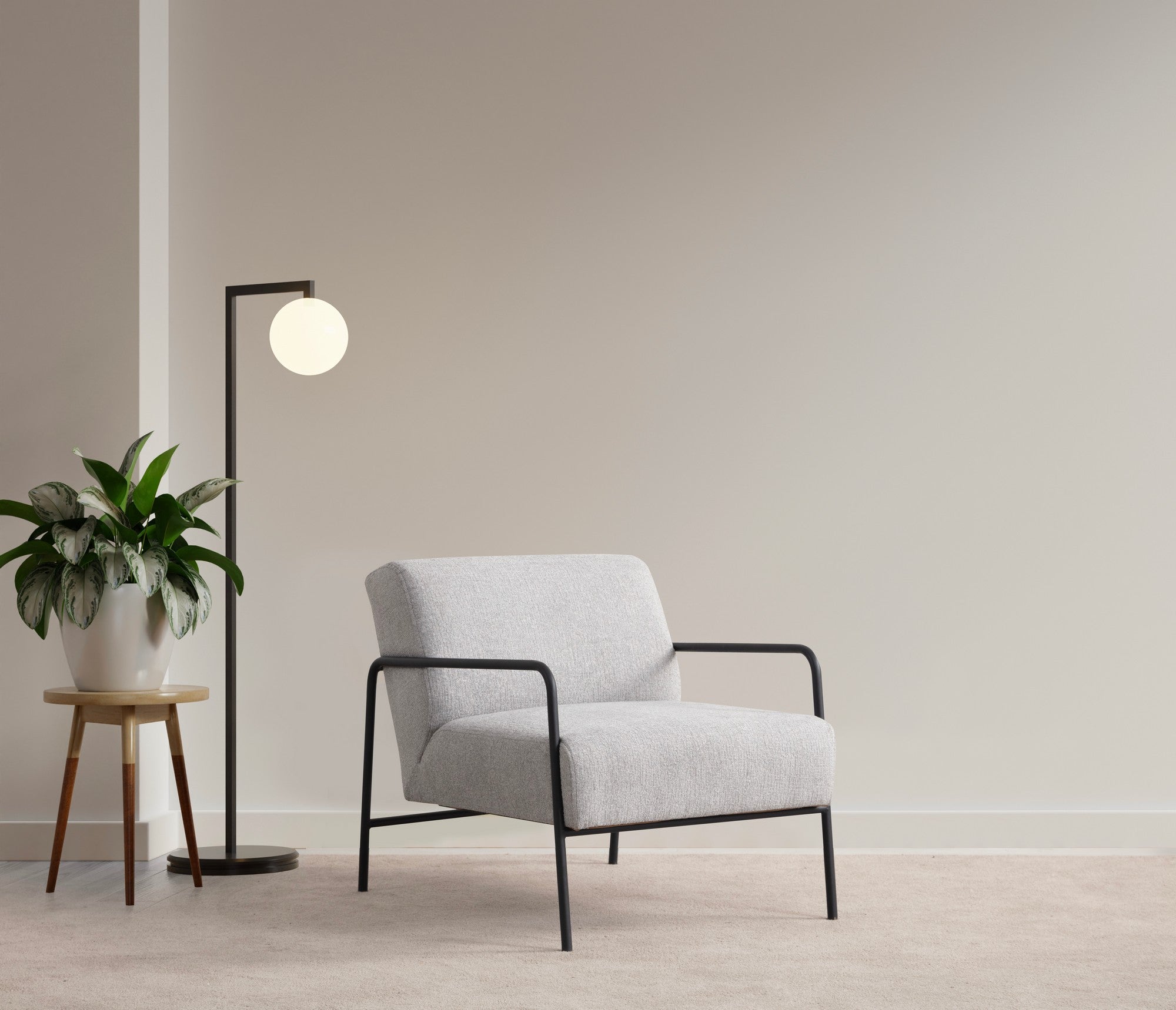Poltrona de orelhas estilosa, tecido cinza, 70 x 90 x 75 cm | Estrutura em madeira de faia e aglomerado, pernas em metal preto | Almofadas de espuma macia, lavável a seco | Perfeita para sala de estar e escritório
