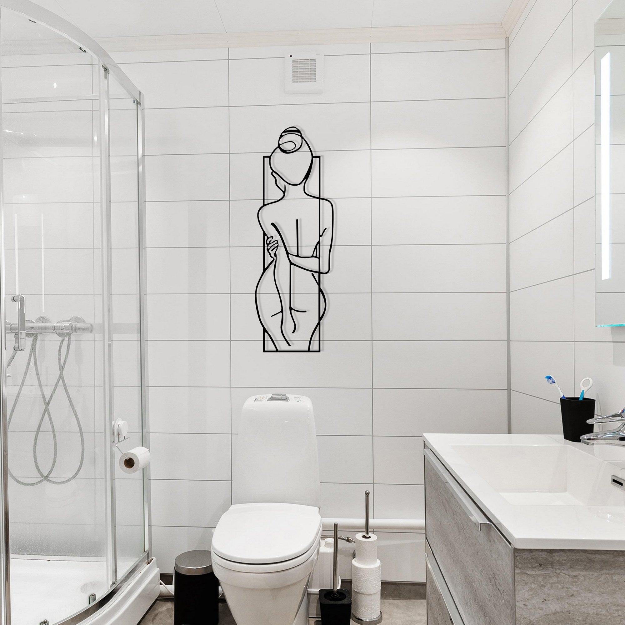 Escultura de Parede em Metal – Postura Feminina, Preto (24 x 69 cm)