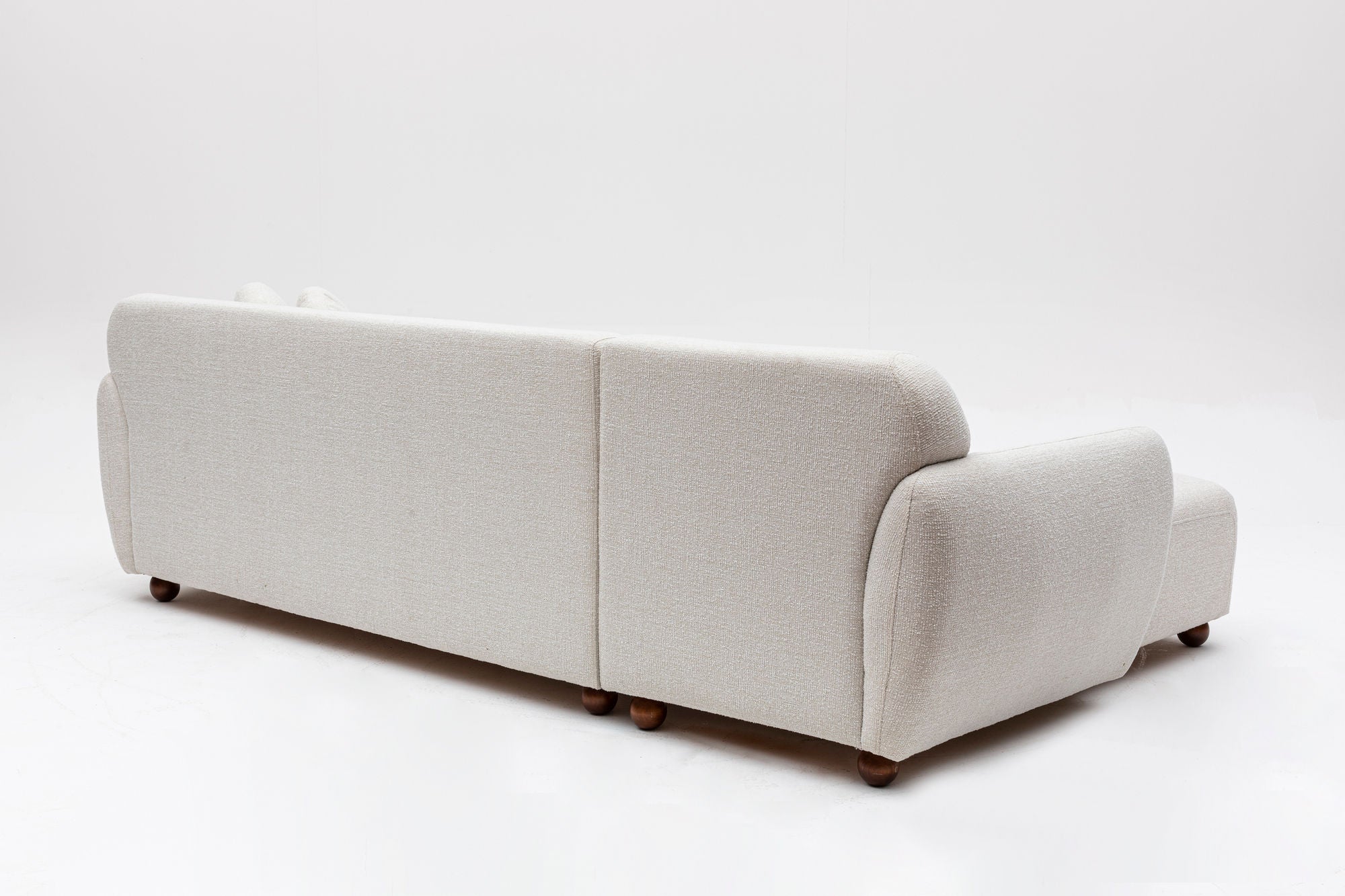 Sofá de canto elegante, estrutura de madeira de faia e aglomerado, 273 x 162 cm, 100% poliéster, 2 almofadas incluídas, pernas de nogueira, lavável a seco, design branco moderno