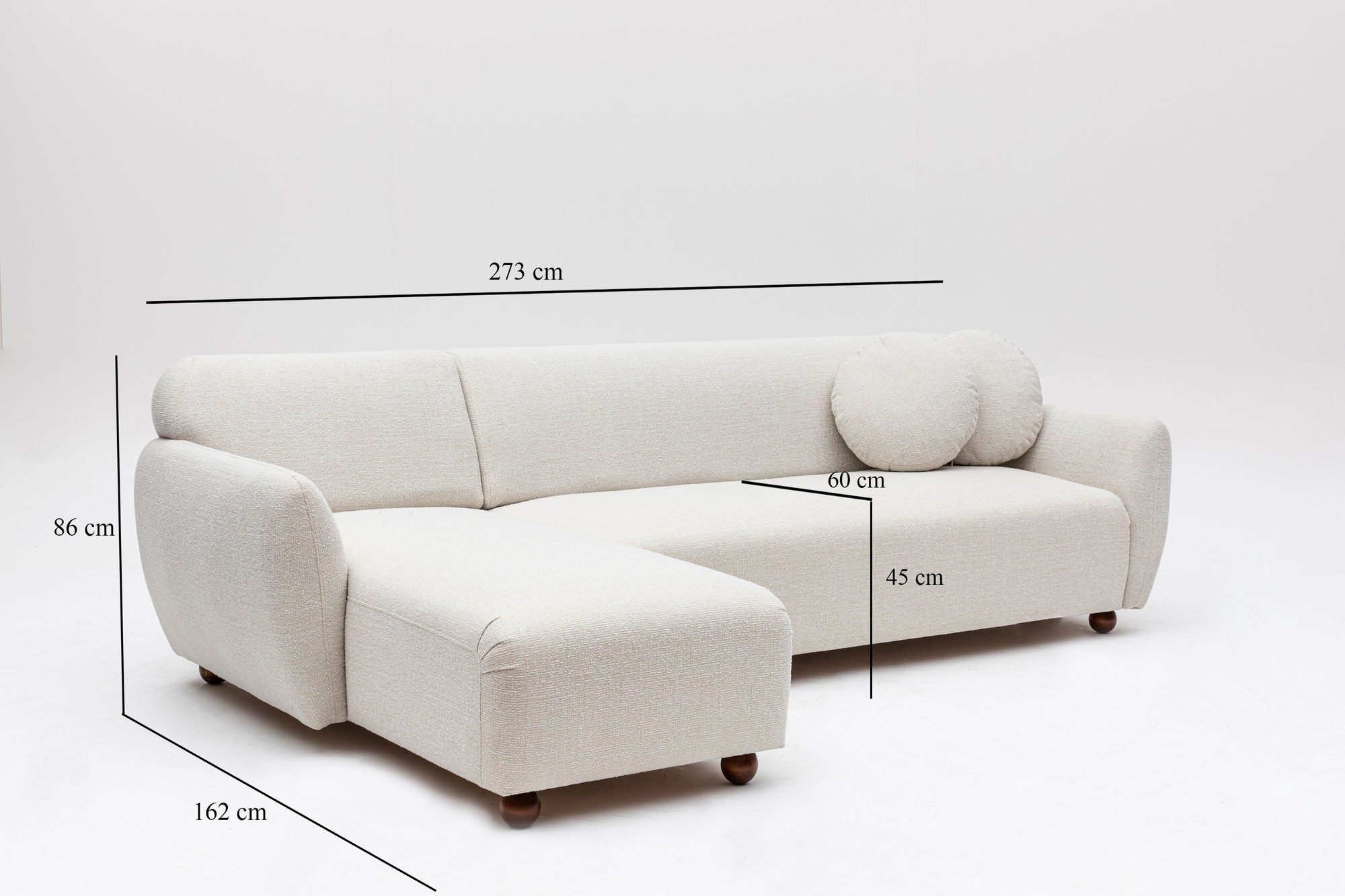 Sofá de canto elegante, estrutura de madeira de faia e aglomerado, 273 x 162 cm, 100% poliéster, 2 almofadas incluídas, pernas de nogueira, lavável a seco, design branco moderno