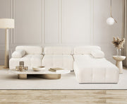 Sofá de canto elegante em tom creme, 300x200 cm | Estrutura em madeira de faia e aglomerado, 100% poliéster, espuma 28 DNS | Design moderno com mecanismo de mudança e tecido lavável a seco
