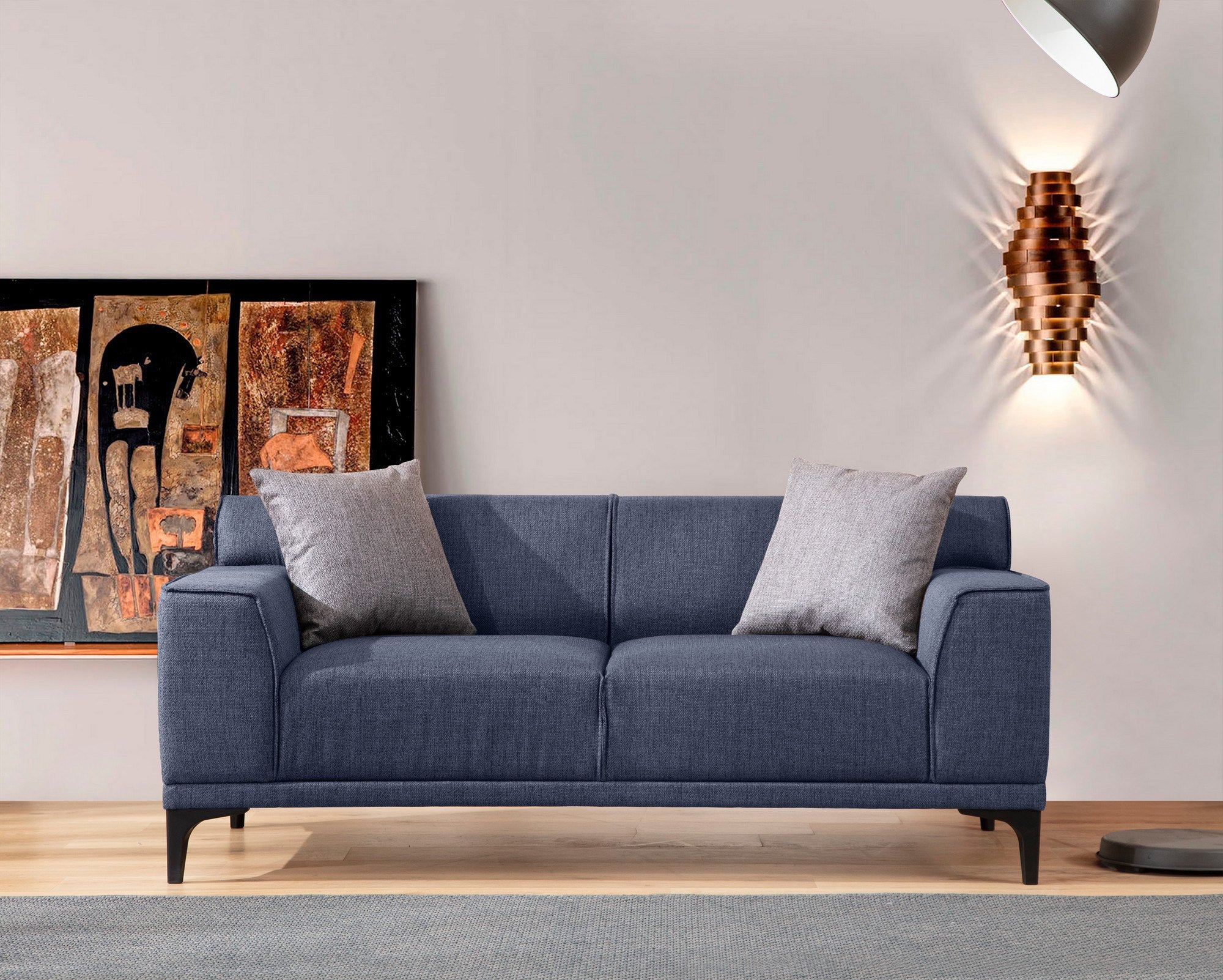 Sofá elegante de 2 lugares, tecido azul, 165 x 87 x 86 cm | Estrutura em madeira de faia e aglomerado, 100% poliéster, inclui 2 almofadas | Design confortável e moderno