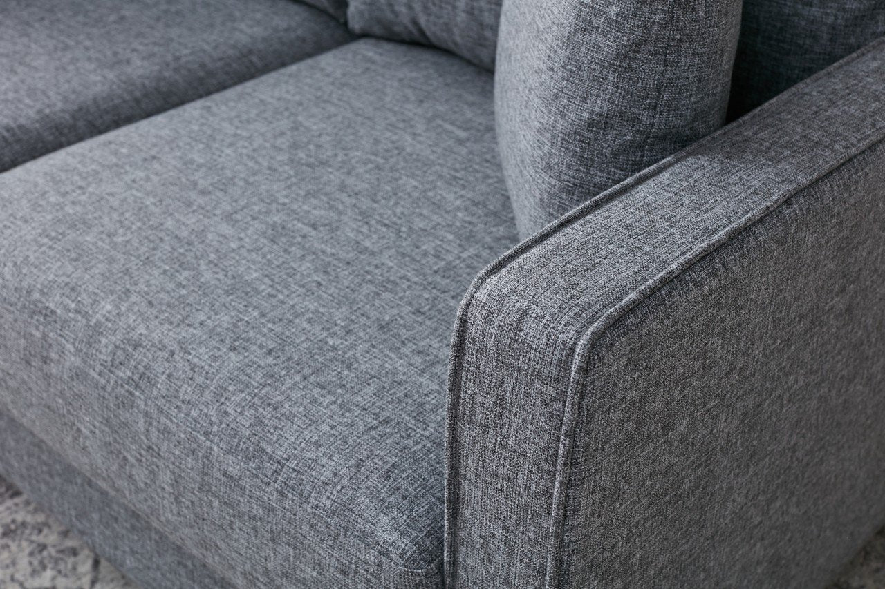 Sofá de canto moderno cinza com pufe, 210 cm | 100% poliéster, tecido fácil de limpar, espuma 28 DNS | Design escandinavo elegante para o conforto da sala de estar